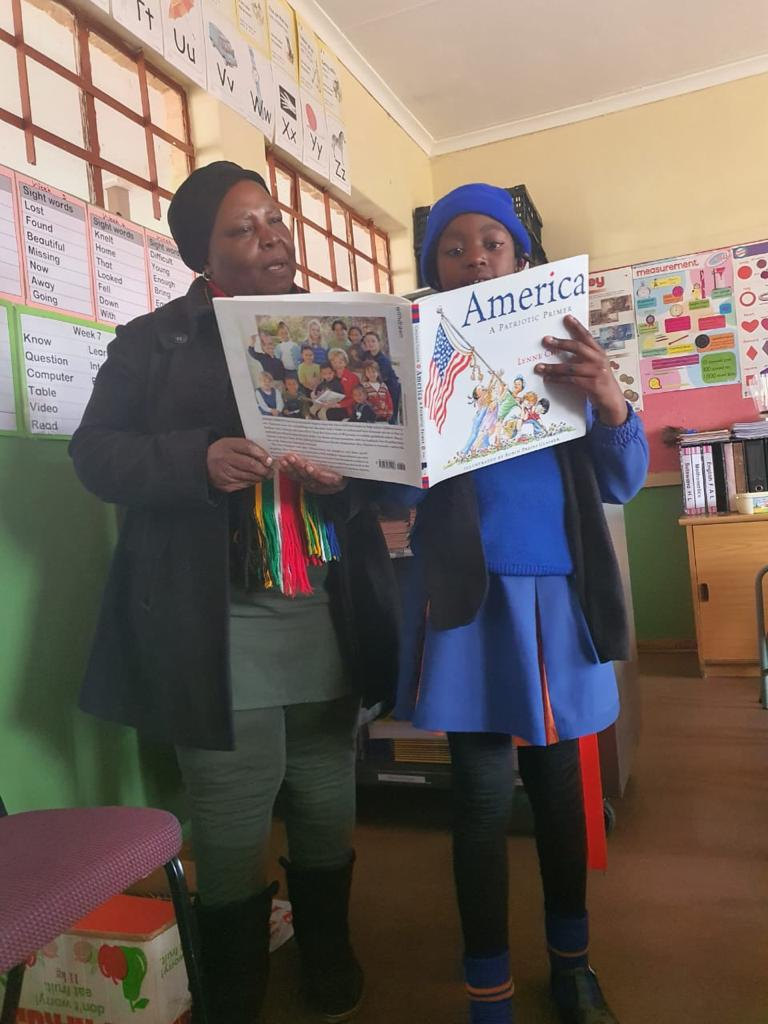 Child reading — Book Collection initiative
