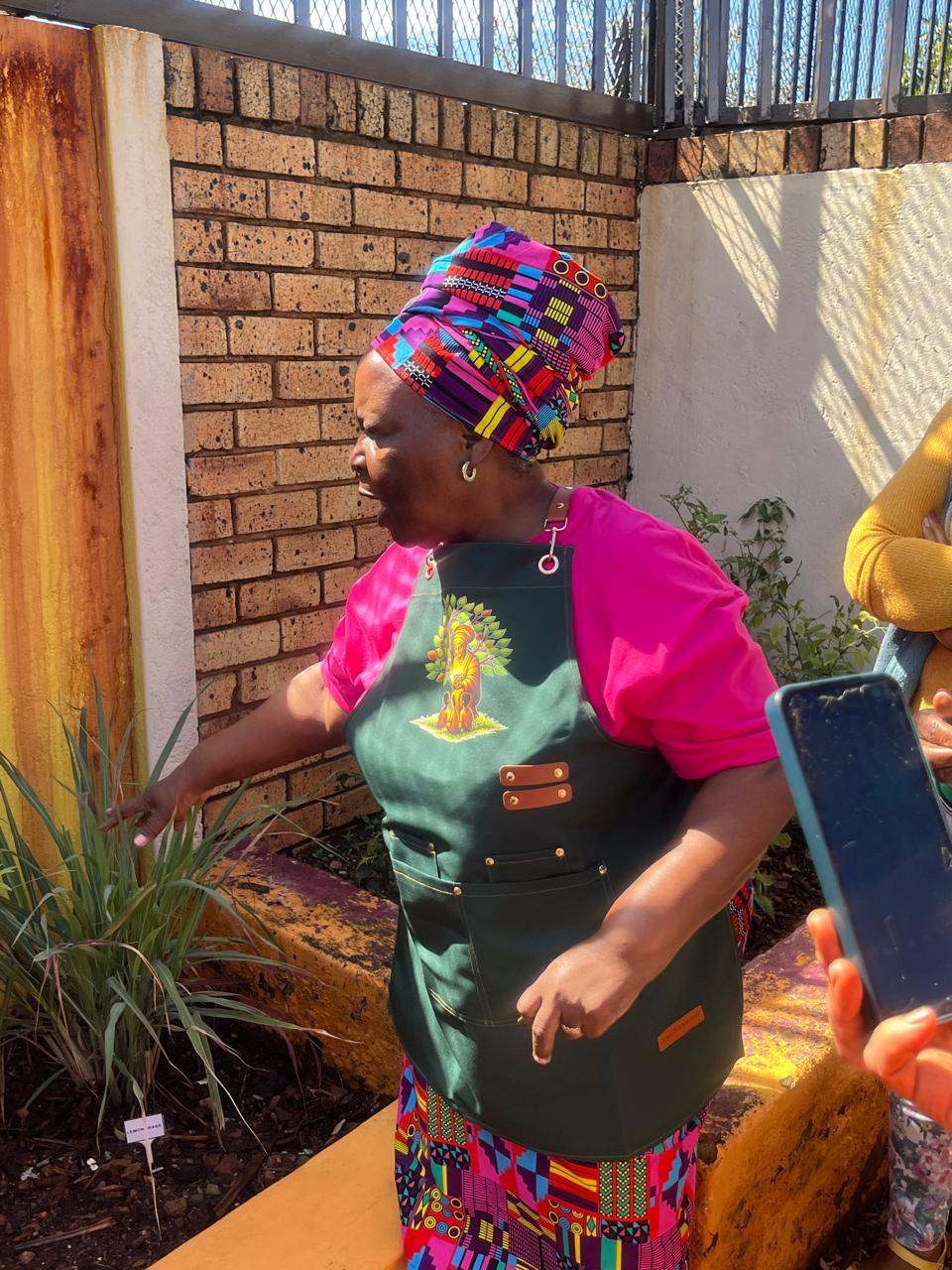 Dr. KeDiBone Mokwena with Granny's Garden Tour team